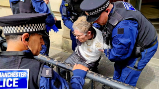 Sword Man Interrupts the Battle of Drag Queen Story Hour
