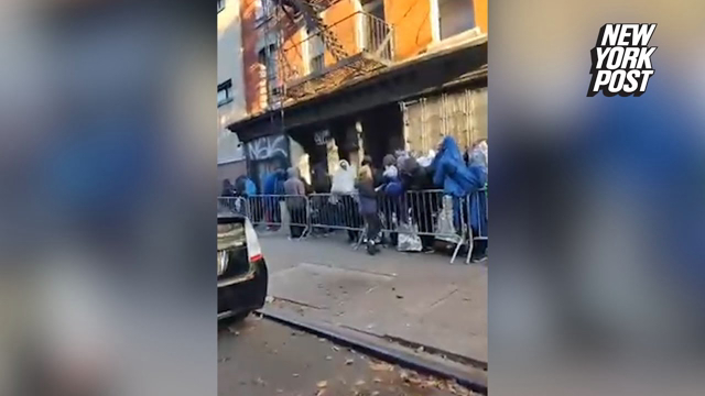 Migrants flood East Village block for shot to get back into NYC shelters: ‘a humanitarian crisis’
