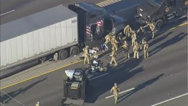 SWAT team pulls driver out of big rig after hours-long standoff on busy Houston freeway