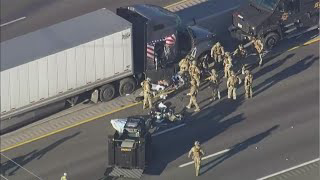 SWAT team pulls driver out of big rig after hours-long standoff on busy Houston freeway