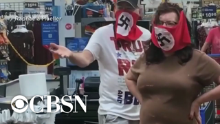 Walmart bans couple who wore swastika masks