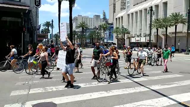 Anti-Mongrel Disease parade with police protection in New Orleans Canal Street.
