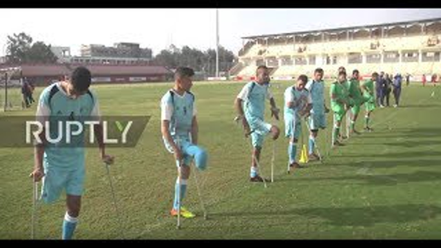 Palestinians wounded by Israeli fire use football to overcome tragedy