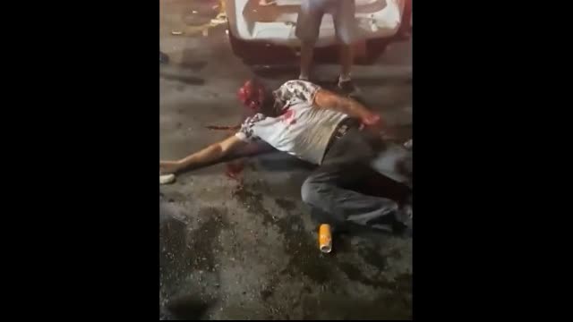 JEWS drag a man out of his car and lynch him