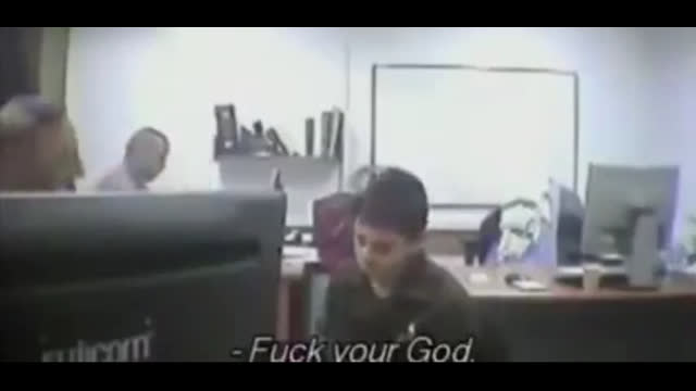 Israeli Cop to Palestinian kid , fuck your God