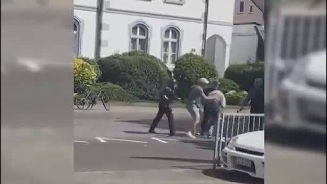 (August, 2023)  German Aryan and their police together to crush the subhuman black nigger apes to protect Germany 卐