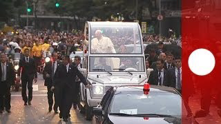 Pope Francis is welcomed by ecstatic crowds in Brazil