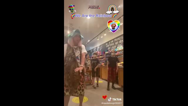 Tranny Teacher teaching children gay pride We're Queer song