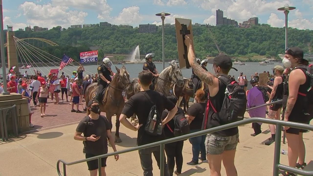 Trump supporters, protesters clash on North Shore during boat parade