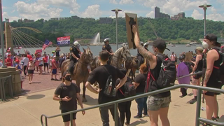 Trump supporters, protesters clash on North Shore during boat parade