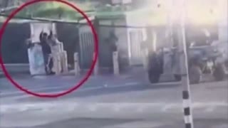 Israeli kills an old Palestinian man raising his hands.