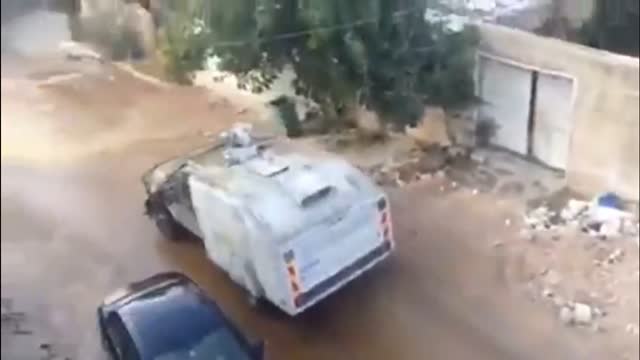 Armored POOPdozer. Palestinians homes sprayed with shit, i wonder why they so mad