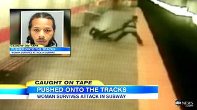 A white woman dragged onto subway tracks after being bruatly beaten by a homeless black man