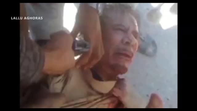 Why was Gaddafi murdered by hilary clinton?