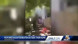 A large pack of female niggers follow an American girl back to her house and assault her