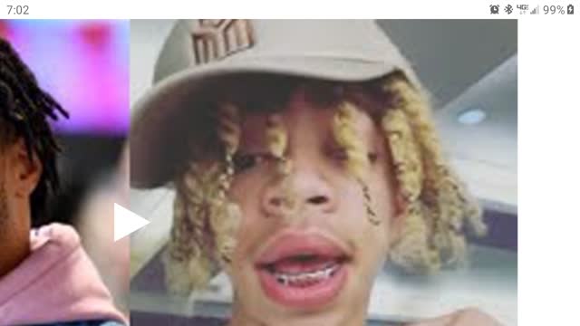 NIGGER invites young white girl on stage, then gets homiez to beat her down stomp her