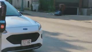 Black In Boxers Crushes Cans In Middle Of Sidewalk