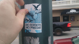 NO BORDERS NO PRISONS