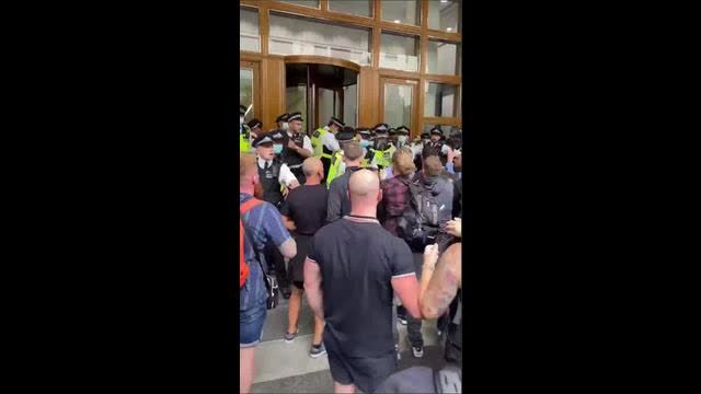 Protesters storm medicines regulator in London over jabs for kids