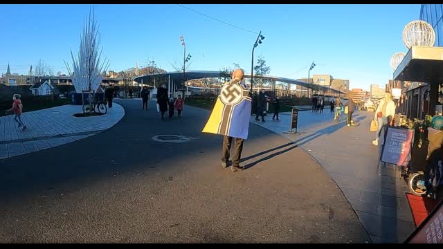 When I handed out flyers with a Swastika on my back