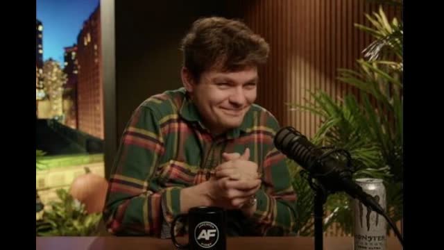 Nick Fuentes rubbing his hands