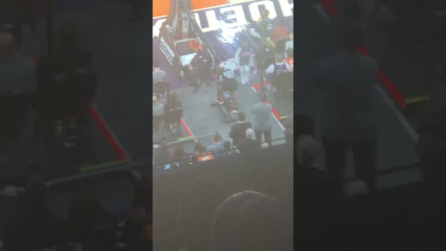 Basketball Player Pensively Rides Exercise Bike As Crowd Boos (CHECK DESCRIPTION)