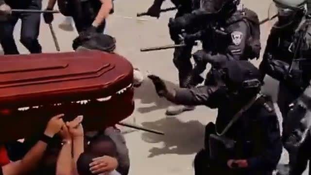 Israeli Police Kindly Beating and Harassing Grieving Palestinian Funeral Attendants: