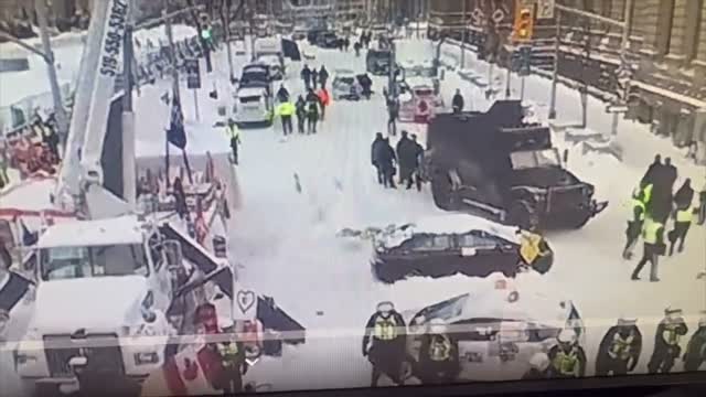 POLICE BEATING CANADIANS FOR PEACEFUL PROTEST