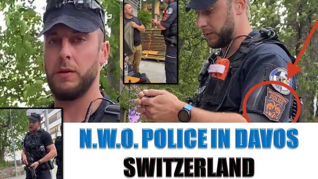 Weird police badge at (((Davos)))