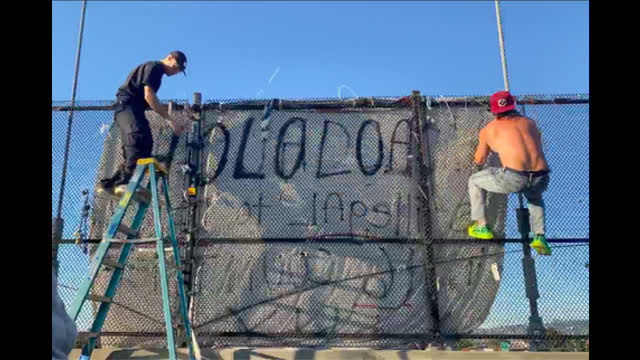 HOLOCAUST DENIAL BANNER DROP