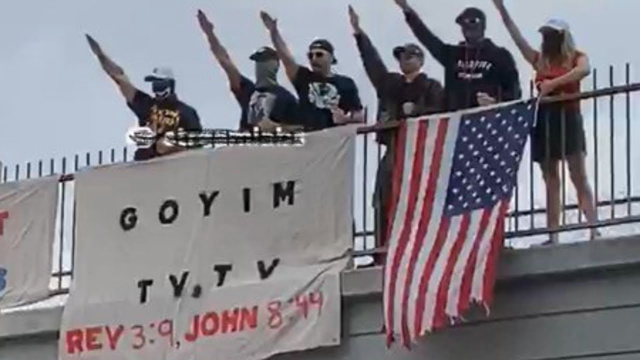 Demonstrators on 405 Freeway overpass support Kanye Westâ€™s antisemitic remarks