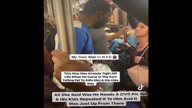 Lunatic Punches Woman in The Face on NYC Subway.