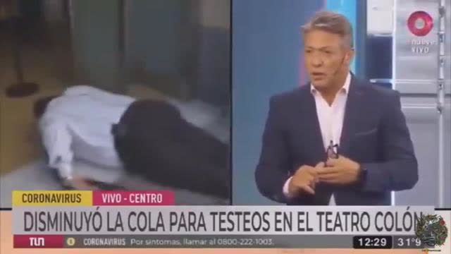 Spanish reporter collapses at vaccine center