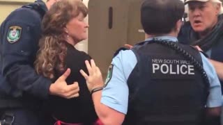 Unmasked Woman Arrested by Thugs