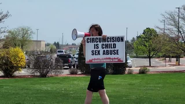 An Intactivist Demonstration at the Corner of Division and South Airport