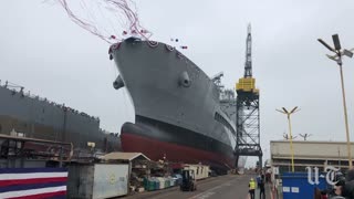The USNS Harvey Milk rolls into the water