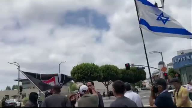 Earlier in LA: Antifa group in Los Angeles confront a Jewish group marching in support of Israel